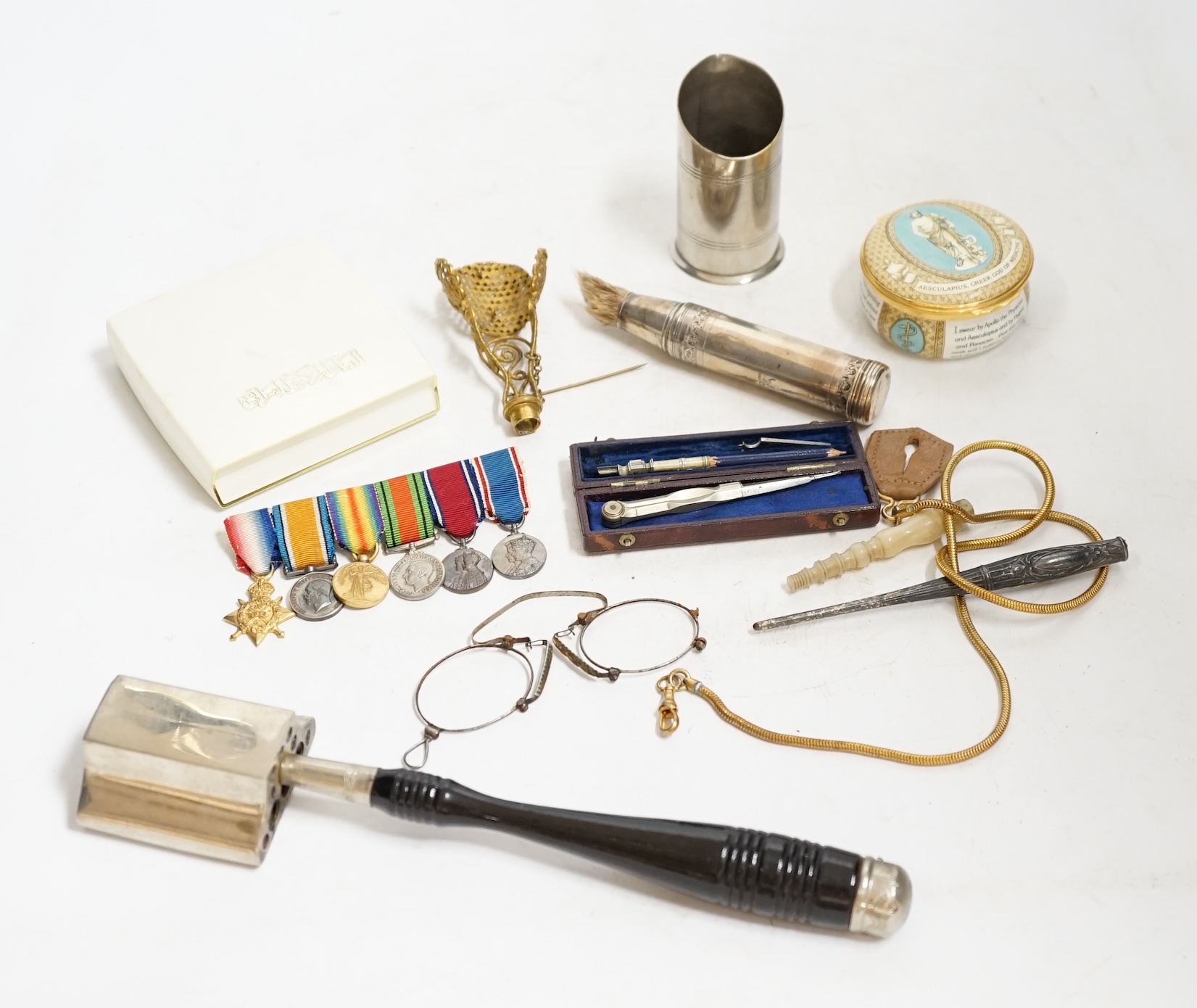 A group of mixed collectables including a gilt metal and turquoise posy holder, silver mounted shaving brush and miniature leather cased drawing set. Condition - varies
